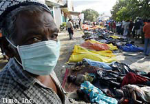 tsunami victims await burial