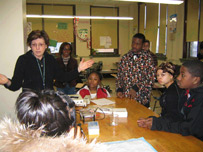 Figure3 a. (left) Seneca teacher and s-l students working with small group project in DNA extraction and gel electrophoresis.  